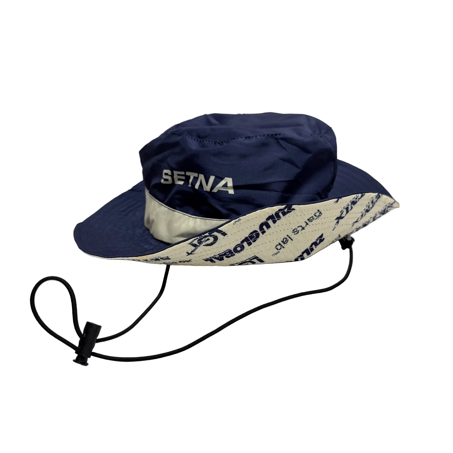 Navy blue sun hat with white brim and 'Setina' branding on a white background