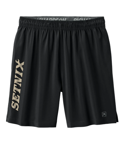 Black athletic shorts with a vertical beige 'SETNIX' logo on the left leg, an elastic waistband with 'RICHARDSON' branding, and a small logo on the lower right hem, shown against a plain white background.